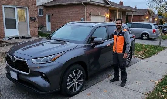 Ahmed K. holding a Thank You Chloe sign