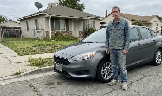 Brian W. holding a Thank You Chloe sign