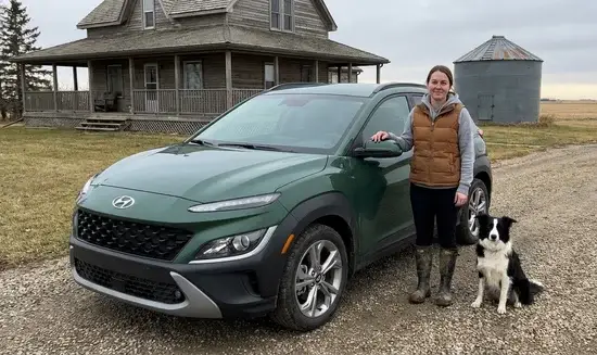 Michelle D. holding a Thank You Chloe sign