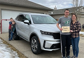 Robert K. with their vehicle